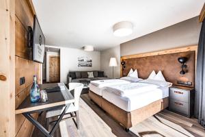 Hotel Edelweiss & Gurgl客房内的一张或多张床位