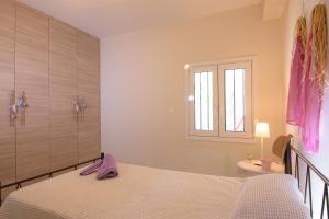 Postel nebo postele na pokoji v ubytování Kristallia - Elounda seafront vacation rental