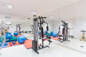 a gym with treadmills and pilates equipment at Krk Mobile Homes in Klimno