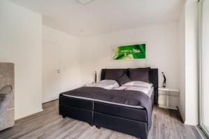 Postel nebo postele na pokoji v ubytování Hotel Hafermarkt