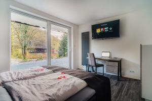 Postel nebo postele na pokoji v ubytování Hotel Hafermarkt