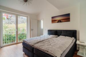 Postel nebo postele na pokoji v ubytování Hotel Hafermarkt