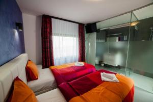 Posteľ alebo postele v izbe v ubytovaní Rodizio Hill Resort