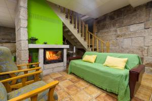 Posezení v ubytování Gran Casa Rural A Touza