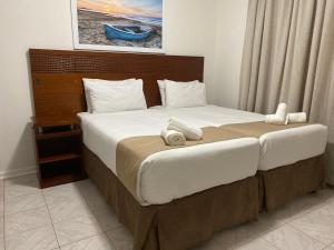 Кровать или кровати в номере Bencorrum Self-Catering Apartments