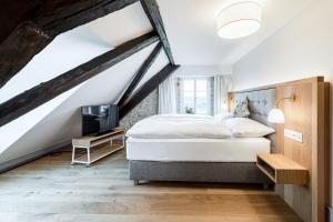 Letto o letti in una camera di Hotel Weissenstein