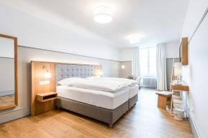 Letto o letti in una camera di Hotel Weissenstein
