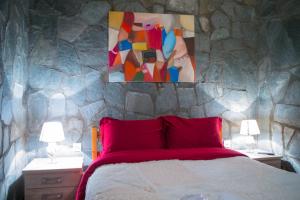Ein Bett oder Betten in einem Zimmer der Unterkunft Konaki inn