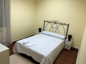 A bed or beds in a room at El cordal de laciana