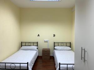 A bed or beds in a room at El cordal de laciana