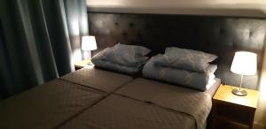 Posteľ alebo postele v izbe v ubytovaní Apartament 4 osobowy w Bel Mare