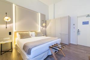 Een bed of bedden in een kamer bij ICON Rosetó