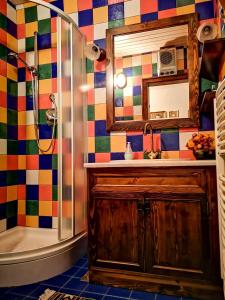 a bathroom with a sink and a mirror at Kranjska Gora Family Break in Kranjska Gora