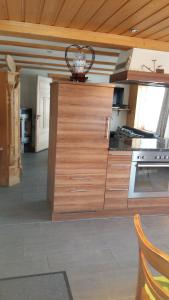 Kuchyň nebo kuchyňský kout v ubytování Chalet Bärgblick