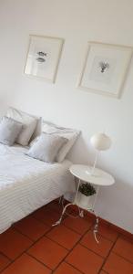 Tempat tidur dalam kamar di Comporta House