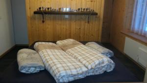 Postel nebo postele na pokoji v ubytování Chalet Bärgblick