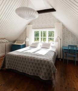 Katil atau katil-katil dalam bilik di Strandvillan Ljugarn