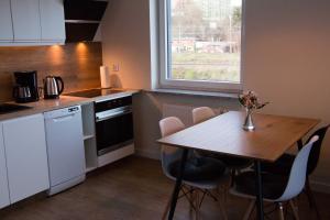 Кухня или мини-кухня в JBHotels - Apartament Deluxe
