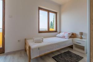 Postel nebo postele na pokoji v ubytování VILLA VISA