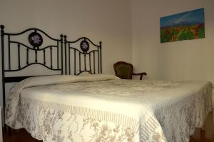 Cama o camas de una habitación en Il Mandorlo B&B