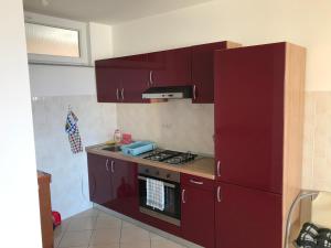 Kuchyňa alebo kuchynka v ubytovaní Gala Apartments