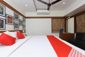 Letto o letti in una camera di Hotel Ramakrishna
