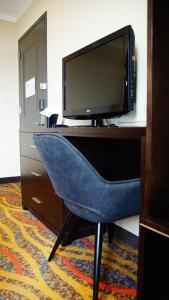 TV a/nebo společenská místnost v ubytování Nesva Hotel - New York City Vista