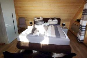Postel nebo postele na pokoji v ubytování Chalet Fuchsberg