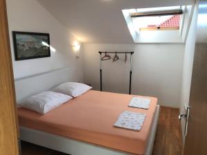 Posteľ alebo postele v izbe v ubytovaní Gala Apartments