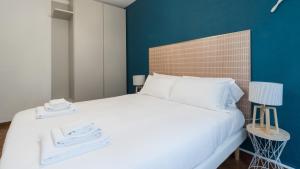 Postel nebo postele na pokoji v ubytování Italianway - Il Borgo apartments