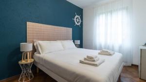 Postel nebo postele na pokoji v ubytování Italianway - Il Borgo apartments