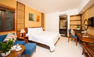 TV a/nebo společenská místnost v ubytování Nadine Phu Quoc Resort & Spa