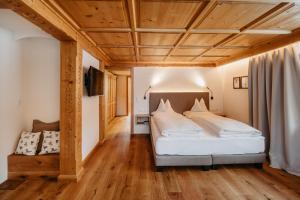 Letto o letti in una camera di Fernsicht Alpen-Apartments