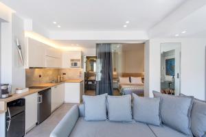 A kitchen or kitchenette at ATHENS PHOS Brand New Loft in Historical Athens Historical Center