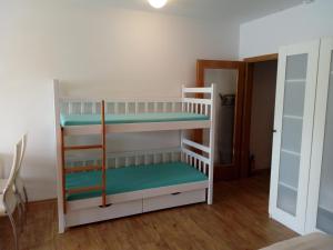 Postel nebo postele na pokoji v ubytování Apartman29