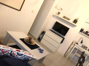 Televízia a/alebo spoločenská miestnosť v ubytovaní Twins' Home Chancillería, Jerez Centro, Cádiz, wifi