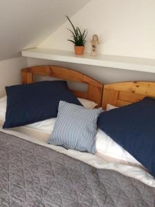 Postel nebo postele na pokoji v ubytování Hotel Večernice