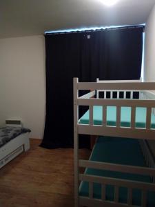 Postel nebo postele na pokoji v ubytování Apartman29
