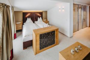 Letto o letti in una camera di Fernsicht Alpen-Apartments