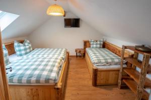 Ліжко або ліжка в номері Eggert's Ferienhaus zum Apfelgarten
