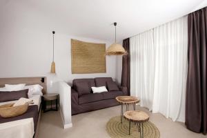 Posteľ alebo postele v izbe v ubytovaní Eques Petit Resort