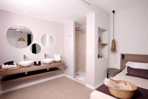 Posteľ alebo postele v izbe v ubytovaní Eques Petit Resort