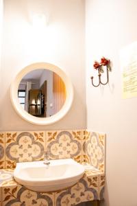 Ett badrum på HMG Rio Suítes