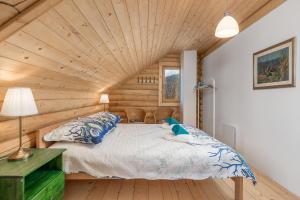 Posteľ alebo postele v izbe v ubytovaní Mountain family home Nola Ivano