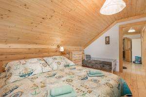 Posteľ alebo postele v izbe v ubytovaní Mountain family home Nola Ivano