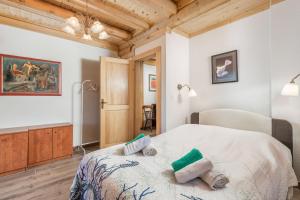 Posteľ alebo postele v izbe v ubytovaní Mountain family home Nola Ivano
