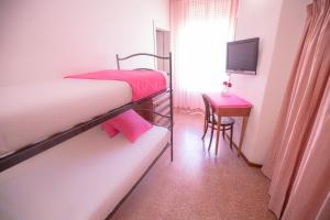 Postel nebo postele na pokoji v ubytování Hotel Villa Sole Resort