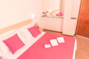 Postel nebo postele na pokoji v ubytování Hotel Villa Sole Resort