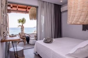 Posteľ alebo postele v izbe v ubytovaní Laia Seafront Luxury Apartments