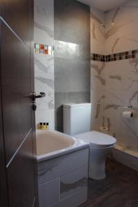Koupelna v ubytování Cheshire Hotel Central London